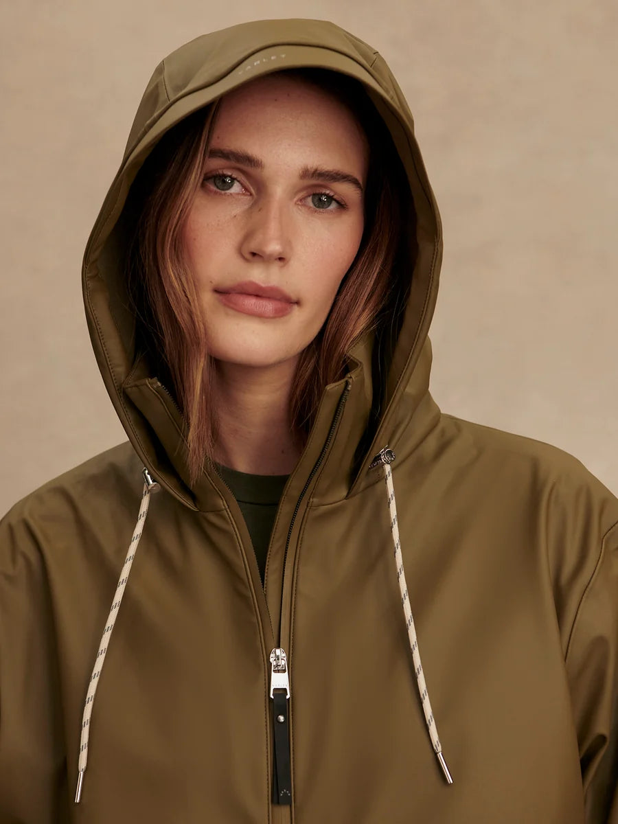 040f4cff809d67892ef3c1e6b1646705933a95c0_VAR01422_ALYSSA_RAIN_JACKET_STONE_OLIVE_122_c350a941-de50-43b2-8f63-226a355f21ed.webp