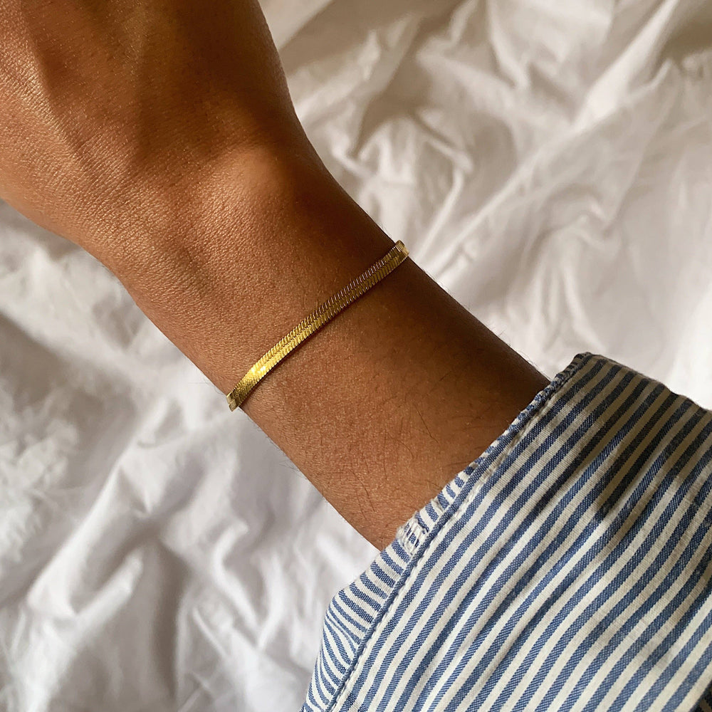 
                      
                        Nassau Gold Bracelet
                      
                    