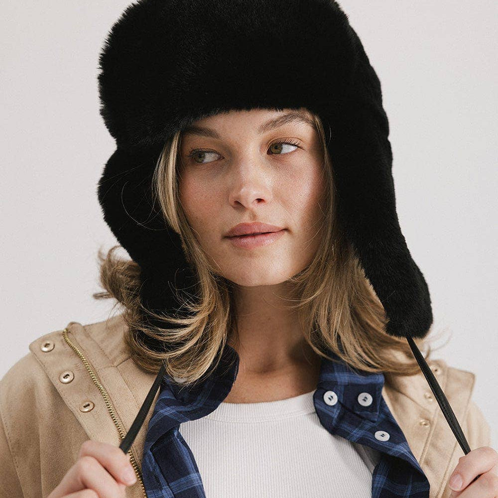 
                      
                        Logan Faux Fur Trapper Hat
                      
                    