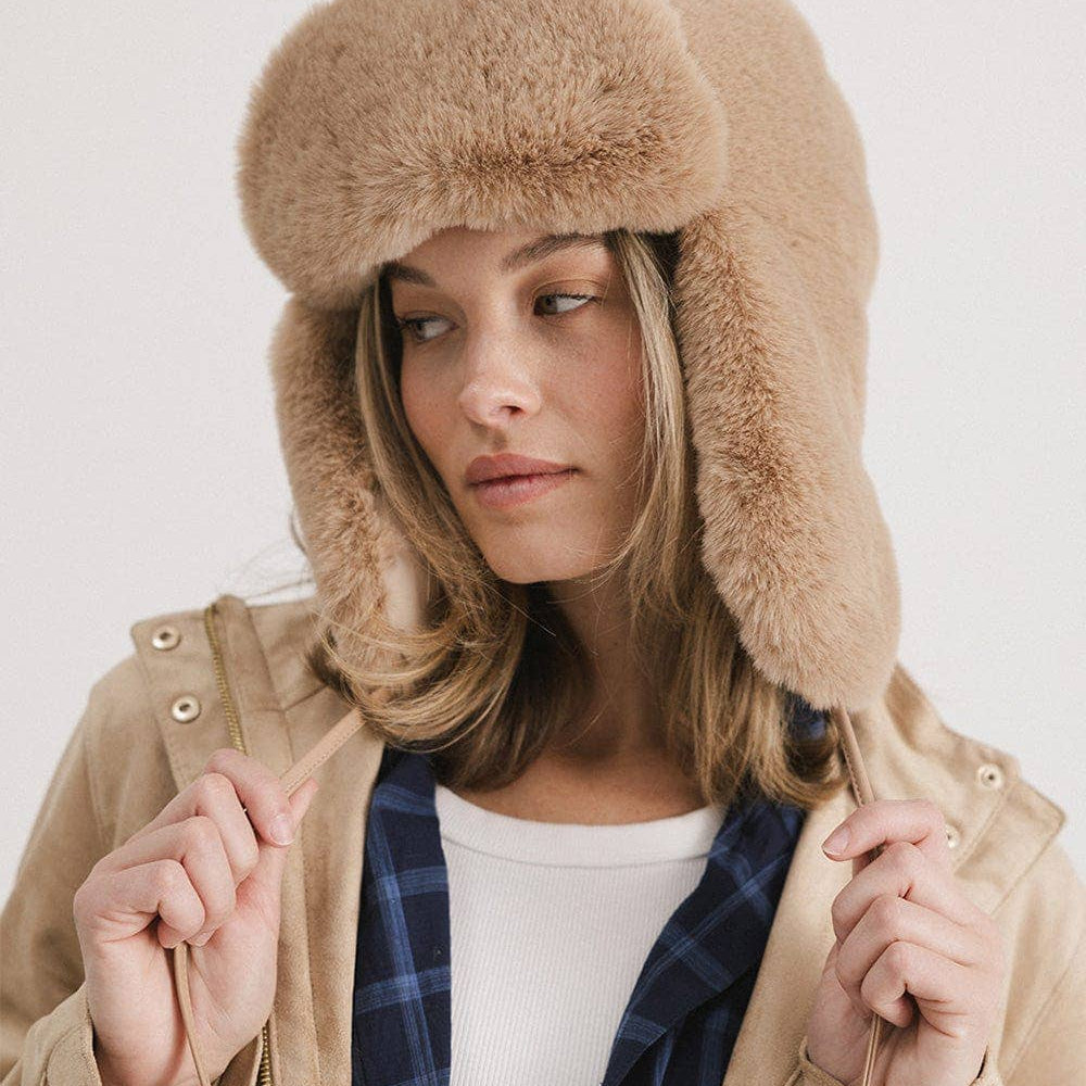 
                      
                        Logan Faux Fur Trapper Hat
                      
                    