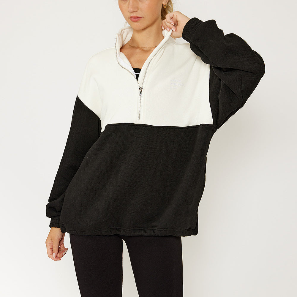 
                      
                        Selena Oversize ½-Zip Pullover: Black N White
                      
                    