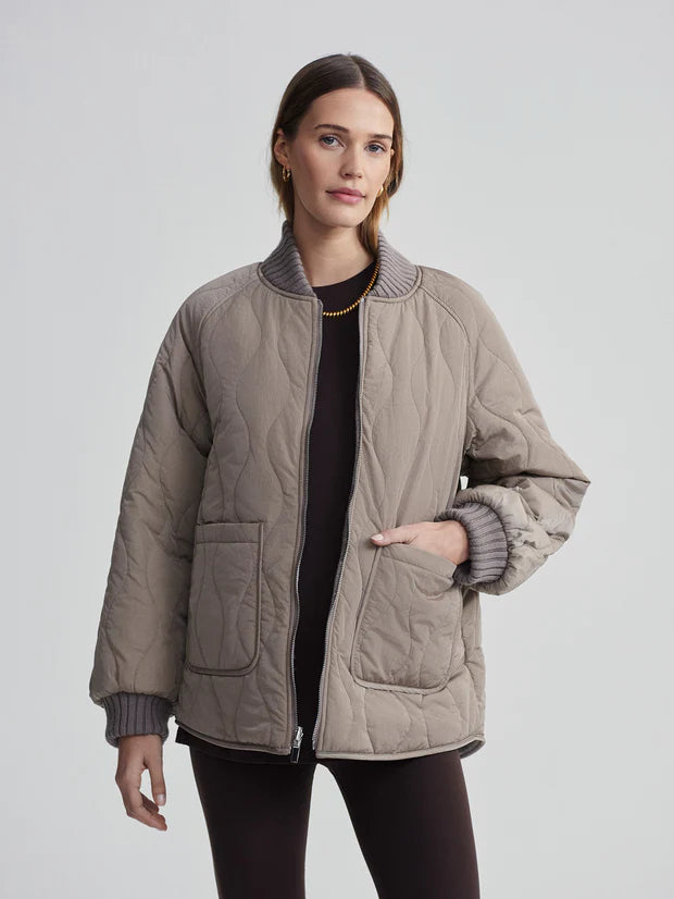 
                      
                        Reno Reversible Quilt Jacket in Fungi
                      
                    