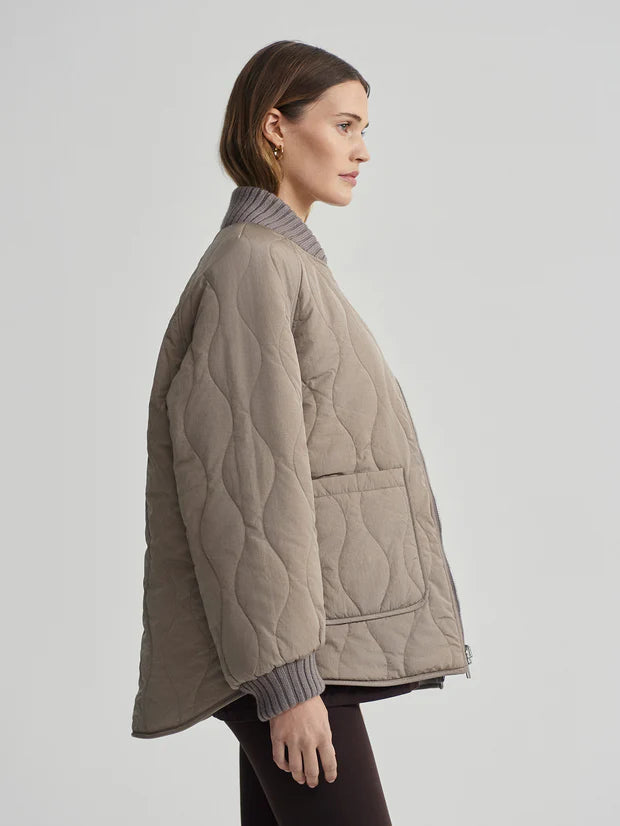 
                      
                        Reno Reversible Quilt Jacket in Fungi
                      
                    